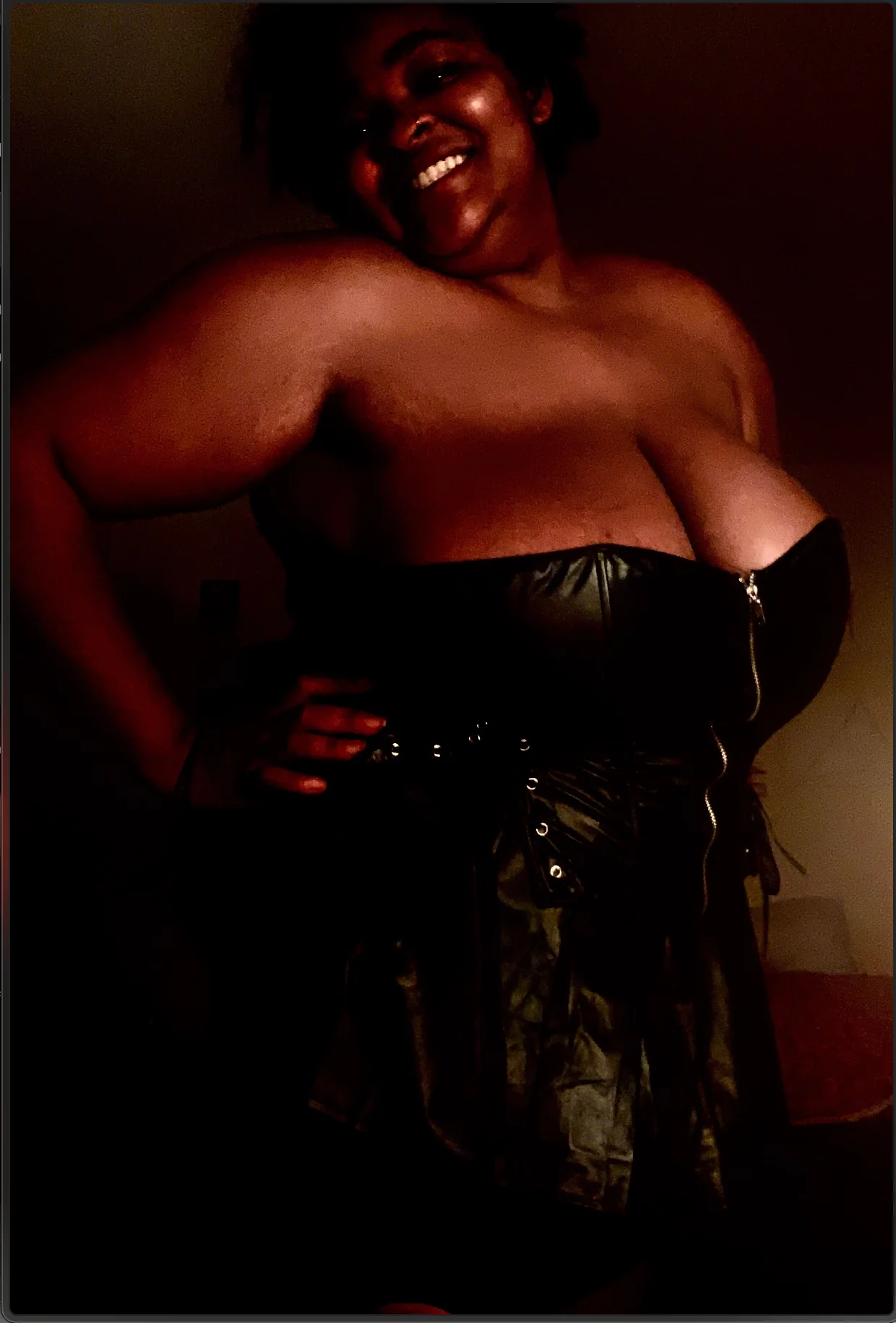 Moody portrait of Demoness Uté in black attire